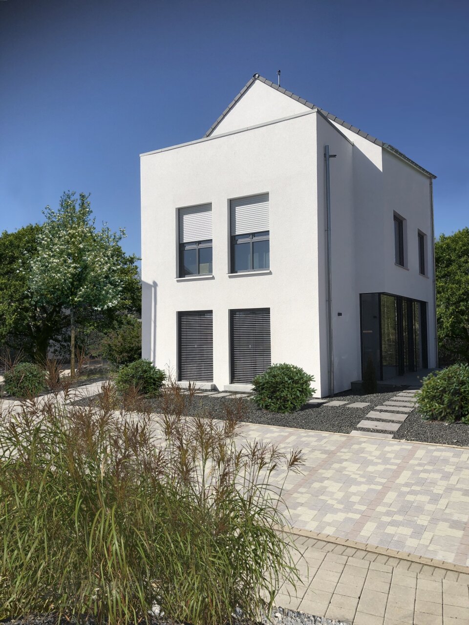 WOHLFÜHLOASE UNTER ZEITLOSEM SATTELDACH